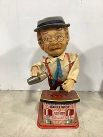 Vintage Charlie Weaver bartender tin toy