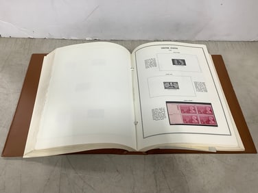 Vintage catalog stamp book with plate blocks
