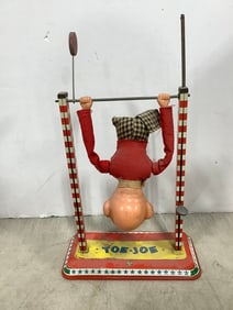 Vintage Toe Joe tin toy