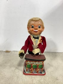 Vintage Charley Weaver bartender tin toy