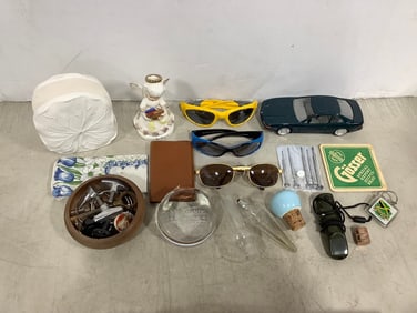 Sunglasses, ceramic napkin holder, BMW car model, and more