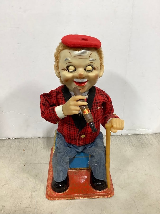 Vintage Smoking McGregor tin toy: Vintage Smoking McGregor tin toy
