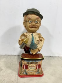 Charley Weaver vintage tin bartender toy