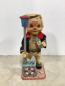Vintage Charley Weaver bartender tin toy