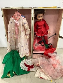 Vintage doll with accessories in case(20in.x10in.x9.5in.-handle of case damaged)