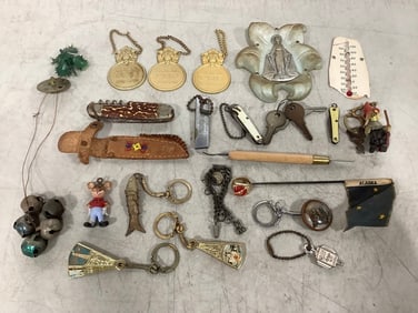 Vintage keychains, pocket knives, and more