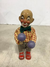 Vintage clown tin toy