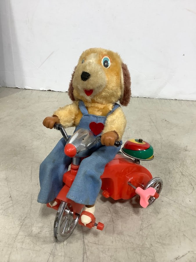 Vintage tin dog on trike toy: Vintage tin dog on trike toy