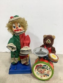 Vintage cha cha battery operated drummer clown tin toy and cha cha drummer clown son
