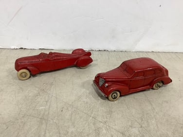 Vintage Oldsmobile 6 toy car and Barberton toy car