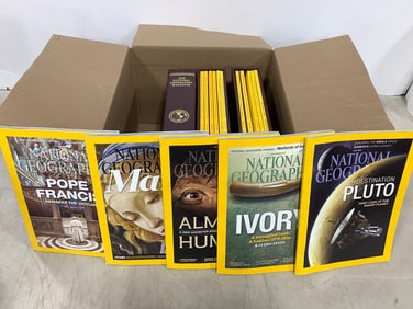 National Geographic magazines in cases
