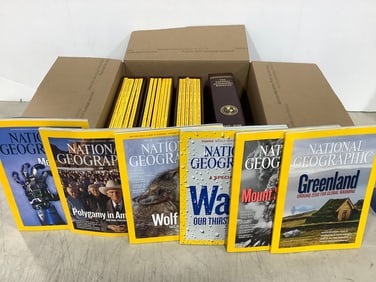 National Geographic magazines in cases