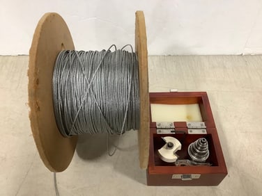 Spool of Steel Cable, and Router Bit