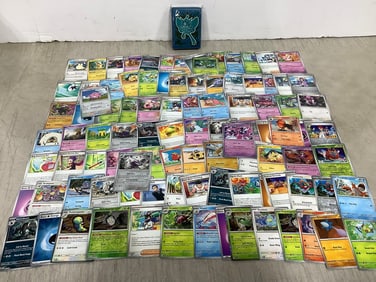 Various Twilight Masquerade Pokemon cards with pack of sleeves