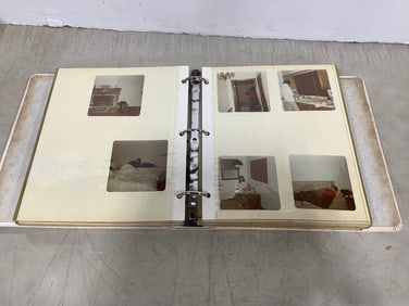 Vintage scrapbook with photographs inside