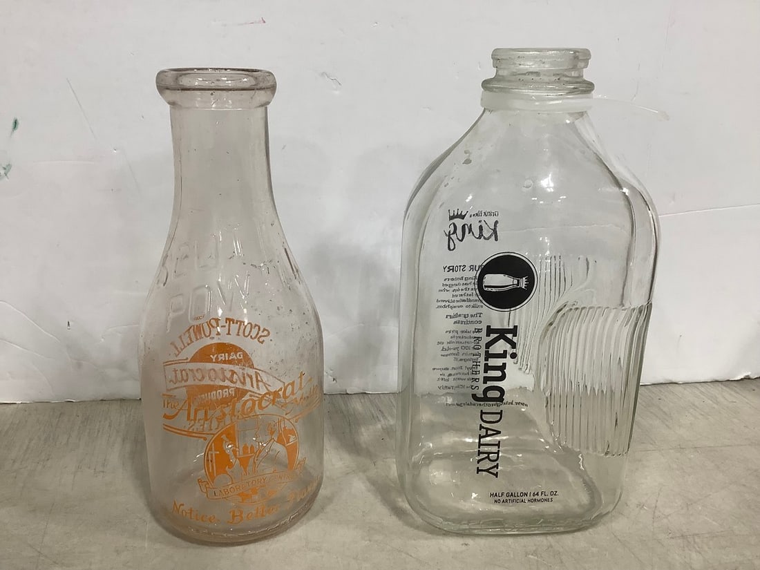 Empty Daiy Bottles (Tallest - 10.25in): Empty Daiy Bottles (Tallest - 10.25in)