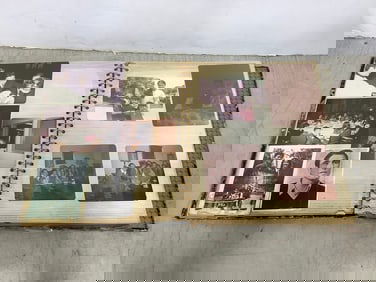 Vintage scrapbook with photographs inside