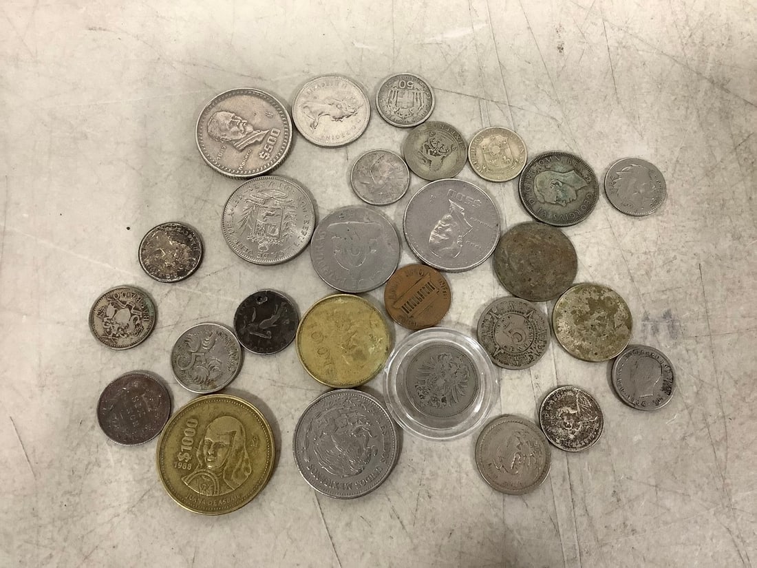 Various silver foreign coins (1 of 1)