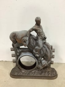 Bronze cowboy(missing clock-14in.tall)