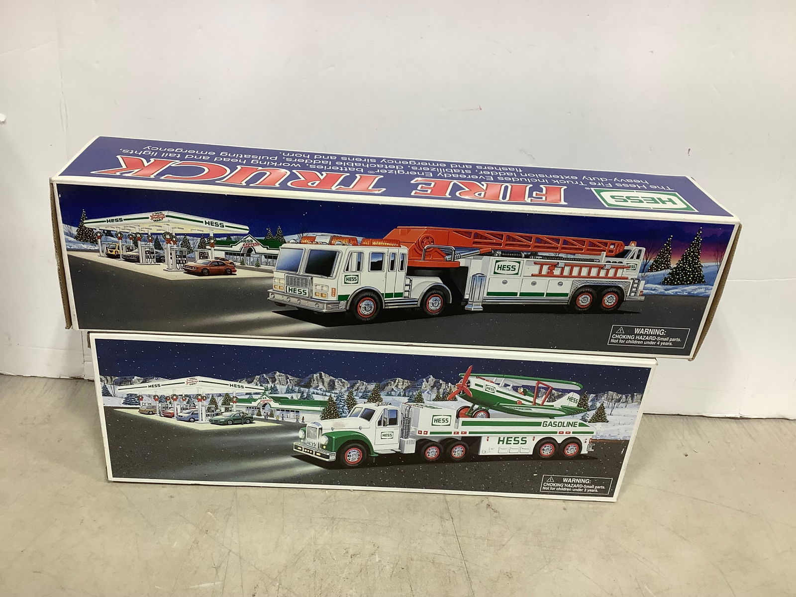 HESS firetruck and HESS toy truck and airplane in box (1 of 1)