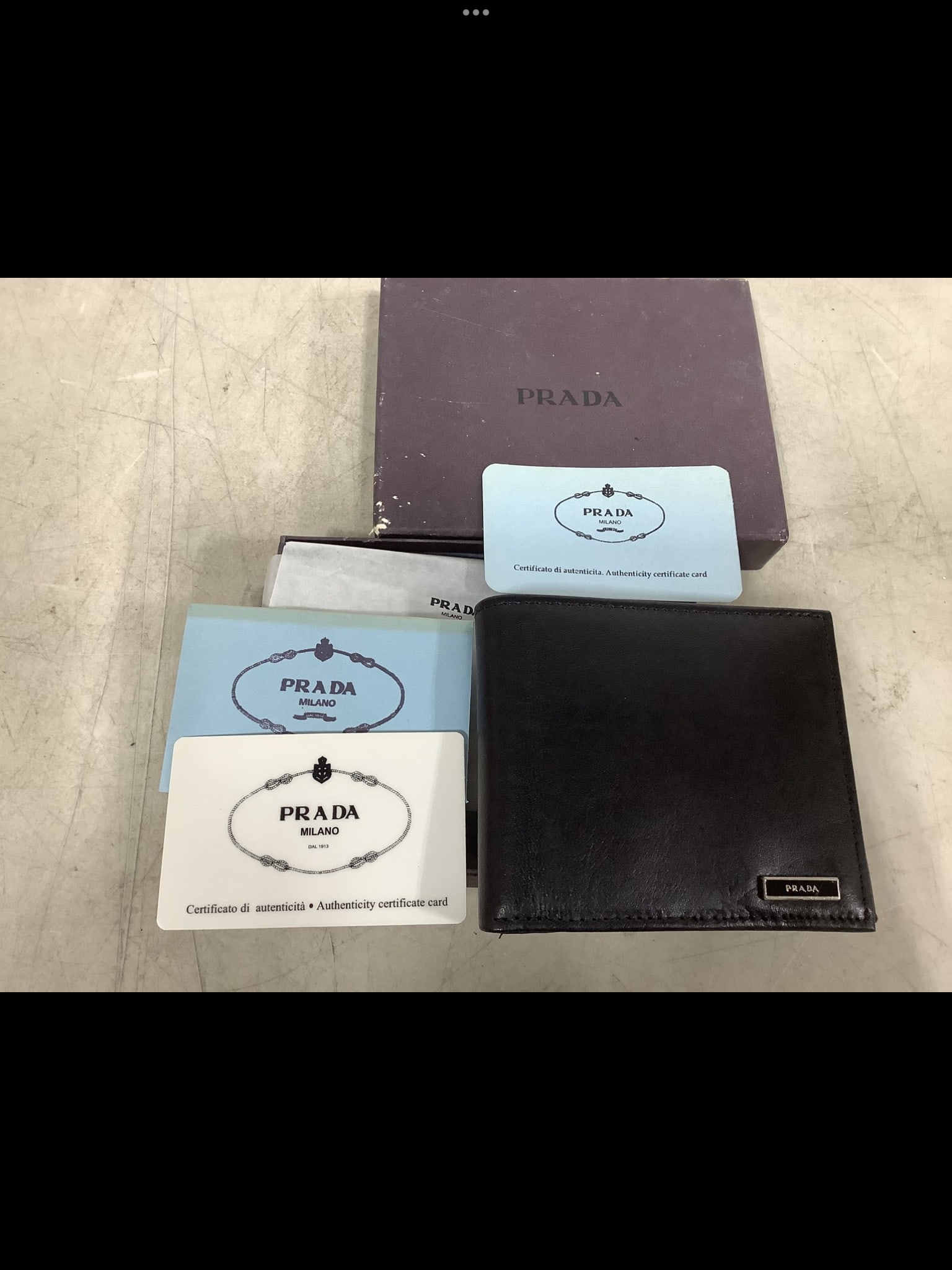 Prada wallet with autheniticty certificate card and box: Prada wallet with autheniticty certificate card and box