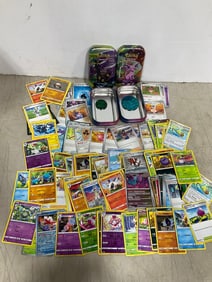 Various Pokemon Cards with Tin Cases