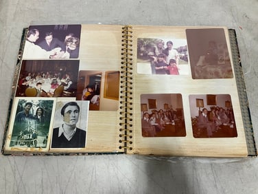 Vintage scrapbook full of photographs