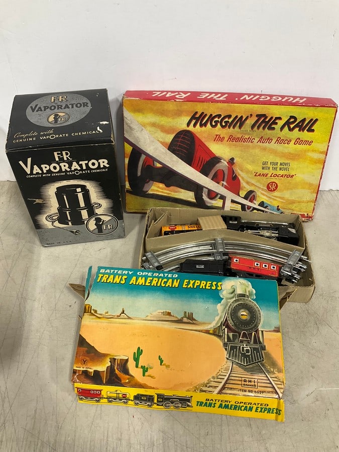 Vaporator device, Trans American Express train set in box, and Huggin the Rail Auto Race Game (1 of 1)