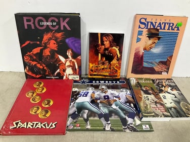 Various books and 2013 Cowboys calendar