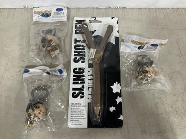 Slingshot pen and skull magnet bottle openers