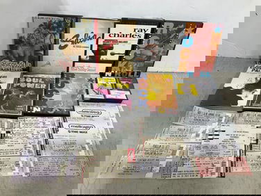 Vintage concert tickets, cassettes, and various DVD's