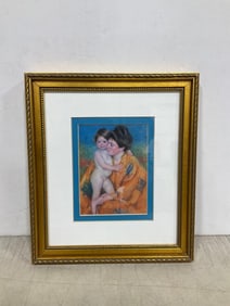 Framed mother and child artwork(9in.x10.5in.)