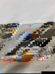 Vintage Nintendo game, phones, sunglasses, vintage badges, and more