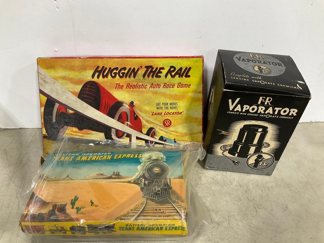 Vaporator device, Trans American Express train set in box and Huggin the Rail auto race game (1 of 1)