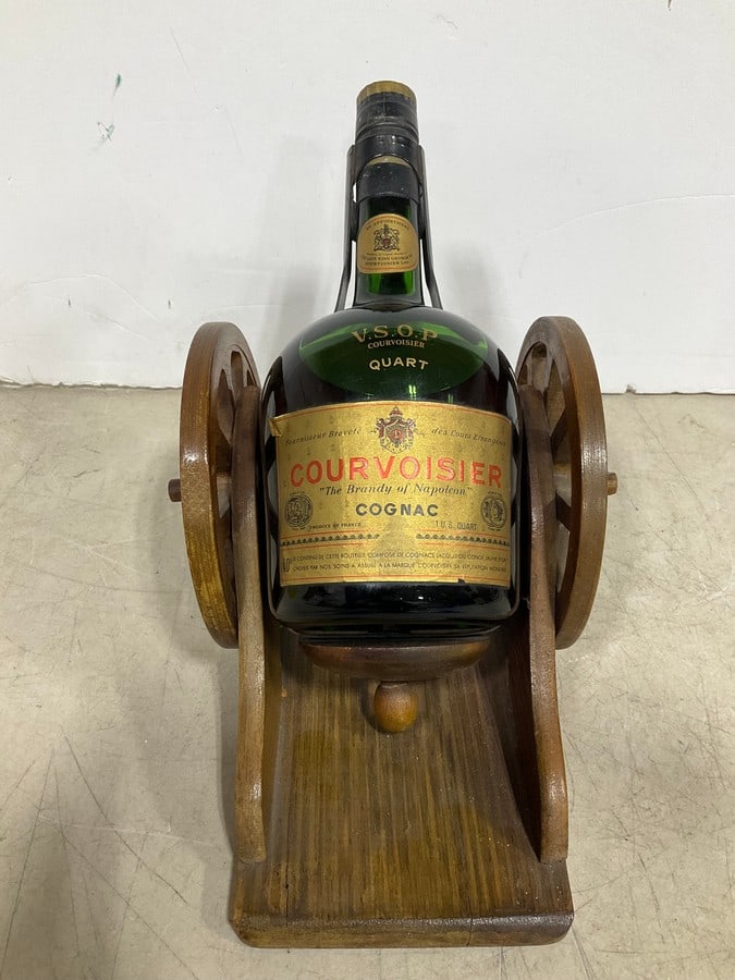 Courvoisier VSOP on cannon display(750mL): Any contents in bottle is Free; You are bidding on the bottle & unbroken tax stamp