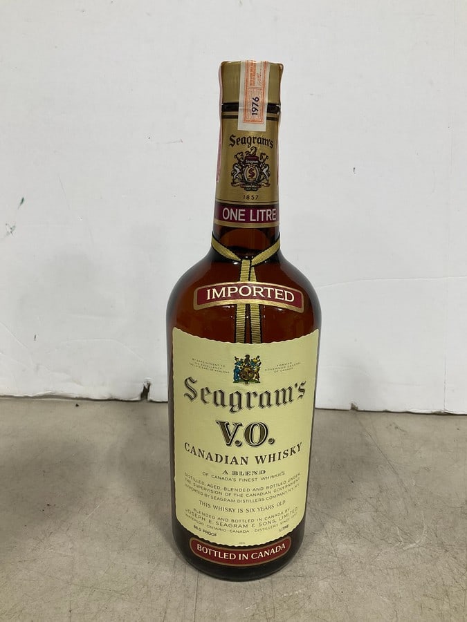Seagrams 1976 V.O. Canadian Whiskey/6 year(1L): Any contents in bottle is Free; You are bidding on the bottle & unbroken tax stamp