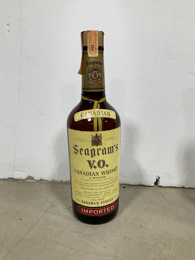 Seagrams 1963 V.O. Canadian Whiskey/6 year(750mL): Any contents in bottle is Free; You are bidding on the bottle & unbroken tax stamp