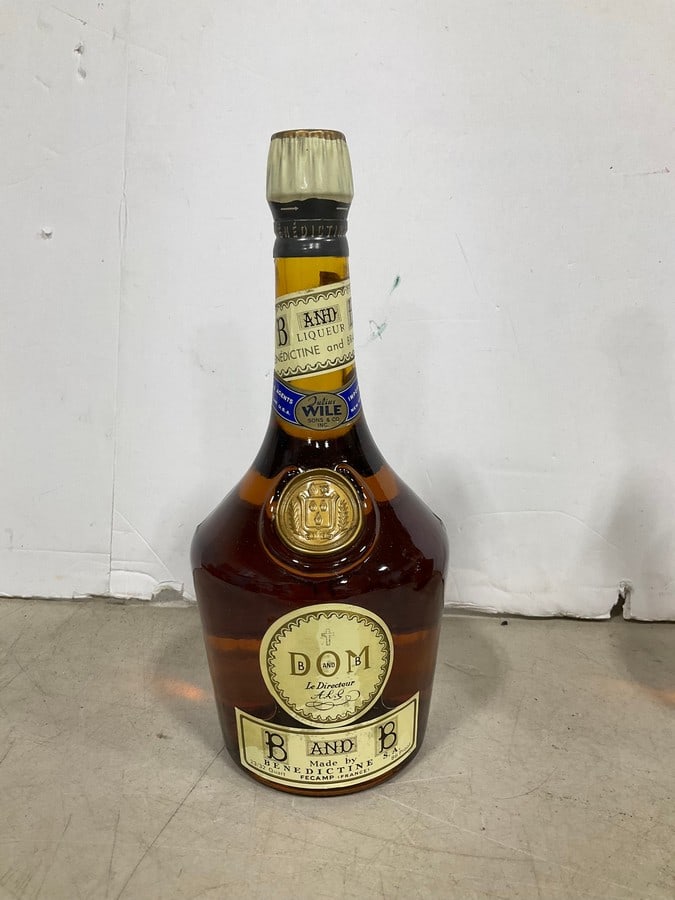 1980s DOM B&B(23/32 quart): Any contents in bottle is Free; You are bidding on the bottle & unbroken tax stamp