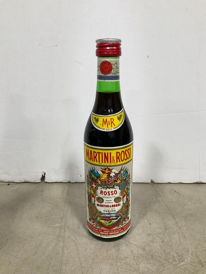 1980's Martini & Rossi Sweet Vermouth(375mL): Any contents in bottle is Free; You are bidding on the bottle & unbroken tax stamp