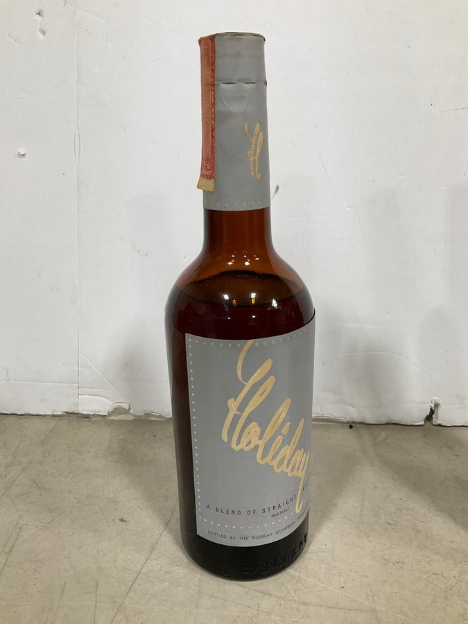 1940's Holiday Blended Straight Whiskey(750mL-RARE, sealed): Any contents in bottle is Free; You are bidding on the bottle & unbroken tax stamp