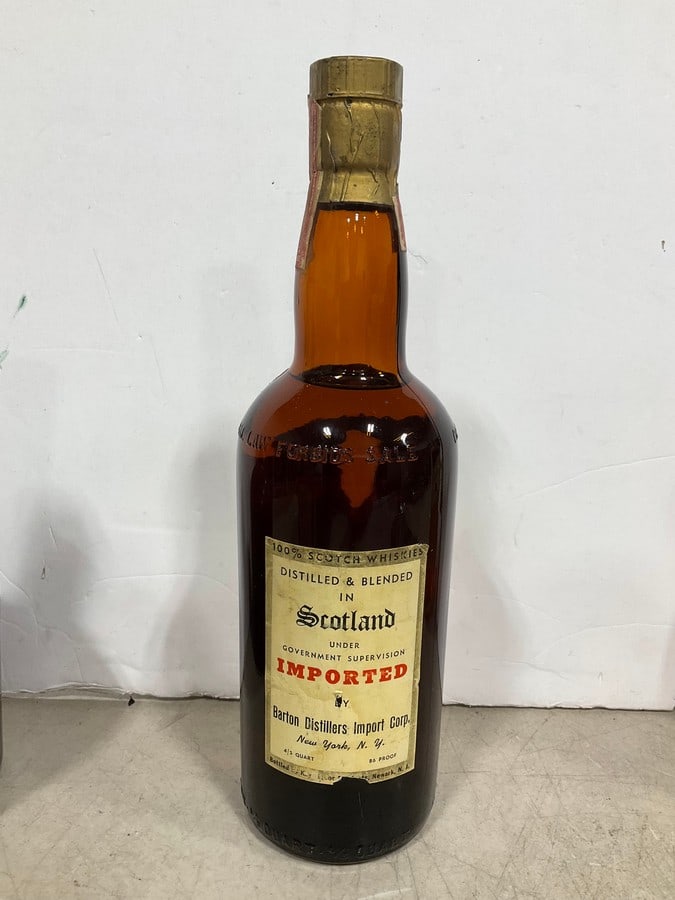 1970's House of Stuart Scotch(750mL): Any contents in bottle is Free; You are bidding on the bottle & unbroken tax stamp
