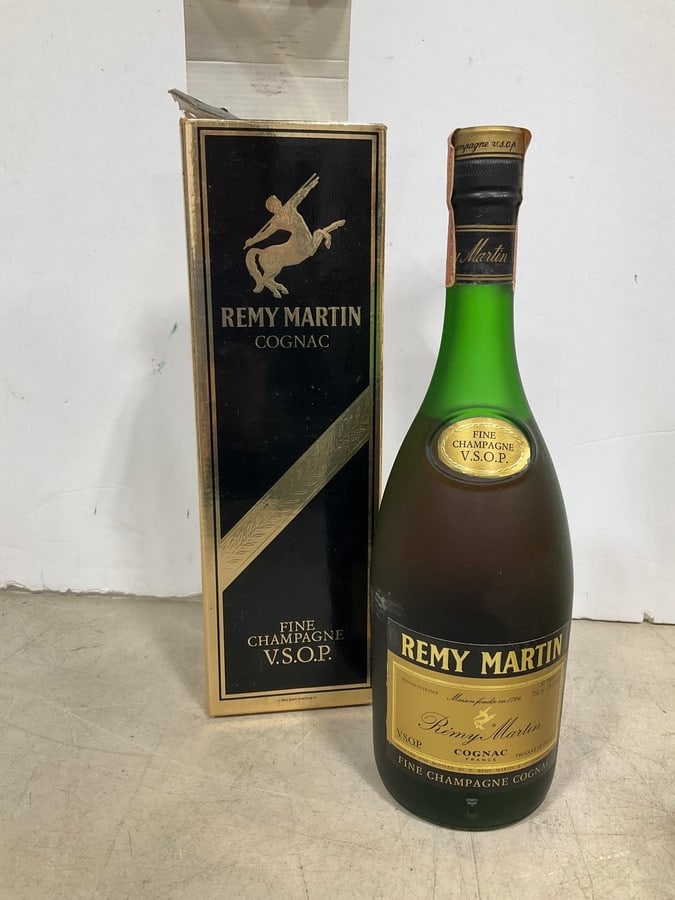 1970's/1980's Remy Martin V.S.O.P. cognac in box(750mL): Any contents in bottle is Free; You are bidding on the bottle & unbroken tax stamp