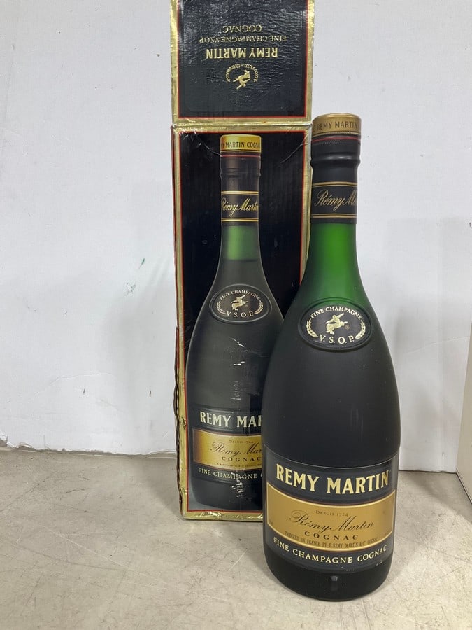 1970's/1980's Remy Martin V.S.O.P. cognac in box(750mL): Any contents in bottle is Free; You are bidding on the bottle & unbroken tax stamp