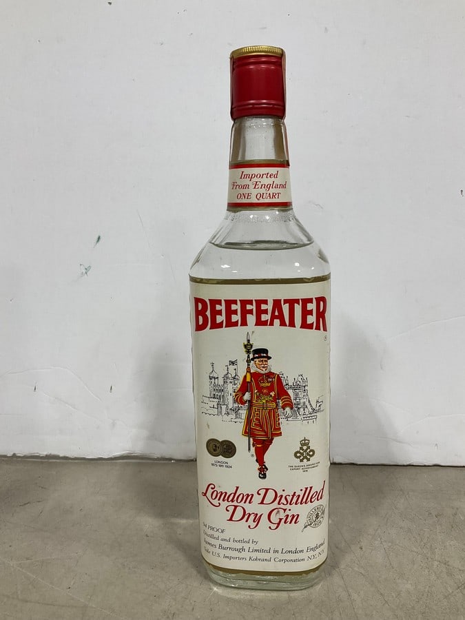 1970's Beefeater Dry Gin(1000mL-sealed): Any contents in bottle is Free; You are bidding on the bottle & unbroken tax stamp