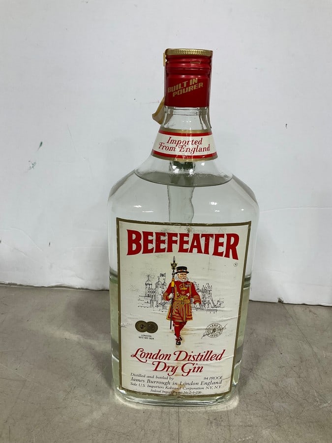 1970's Beefeater Dry Gin(1.75L-sealed): Any contents in bottle is Free; You are bidding on the bottle & unbroken tax stamp