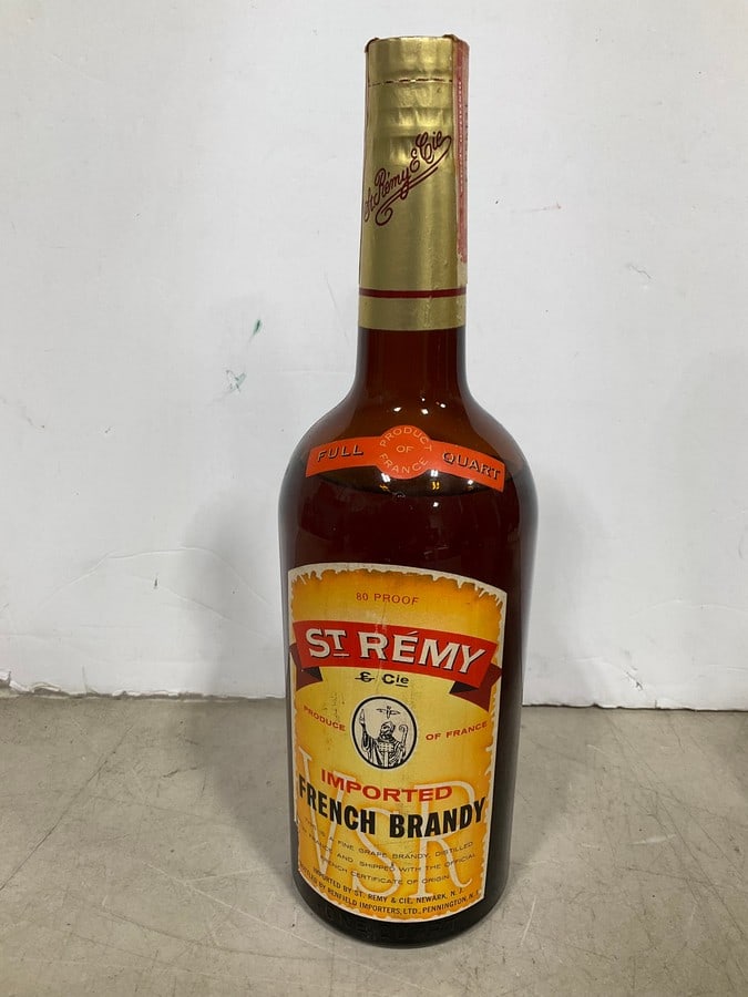 St. Remy imported french brandy(750mL): Any contents in bottle is Free; You are bidding on the bottle & unbroken tax stamp