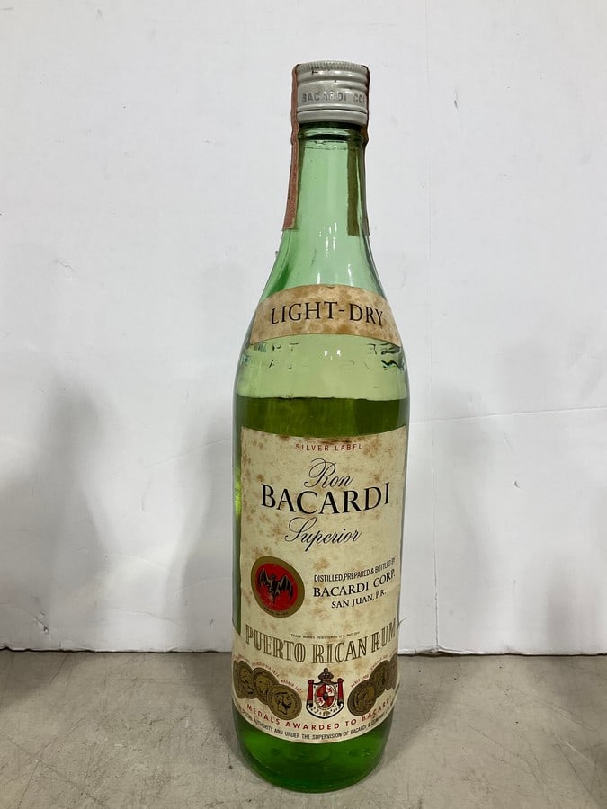 Ron Bacardi Silver label puerto rican rum(750mL): Any contents in bottle is Free; You are bidding on the bottle & unbroken tax stamp