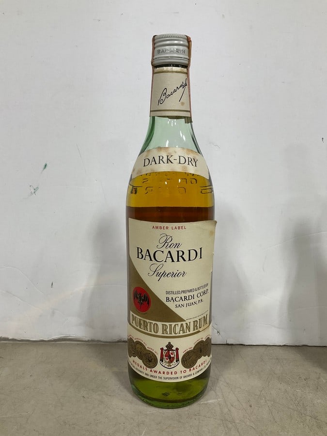 Ron Bacardi amber label puerto rican rum(750mL): Any contents in bottle is Free; You are bidding on the bottle & unbroken tax stamp