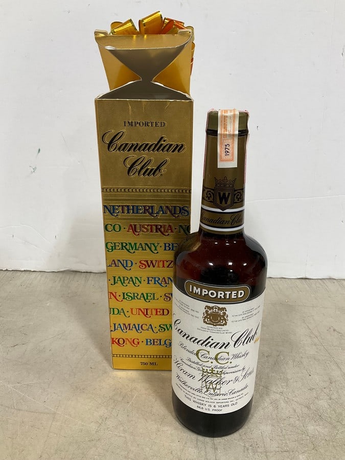 1975 Canadian Club Blended Whiskey/6 year sealed in box(750mL): Any contents in bottle is Free; You are bidding on the bottle & unbroken tax stamp