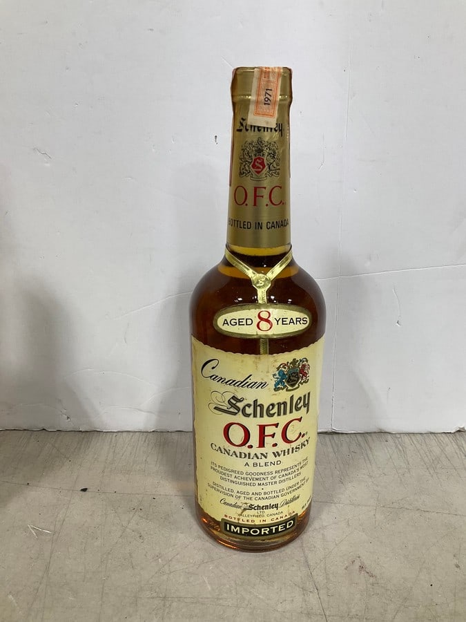 1971 Canadian Schenley canadian Whiskey/6 year sealed in box(750mL): Any contents in bottle is Free; You are bidding on the bottle & unbroken tax stamp